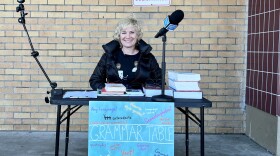a woman sitting at a table
