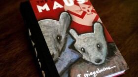The cover of the graphic novel "Maus" by Art Spiegelman. A school board in Tennessee has added to a surge in book bans by conservatives with an order to remove the award-winning 1986 graphic novel on the Holocaust, "Maus," from local student libraries. Author Art Spiegelman told CNN on January 27 — coincidentally International Holocaust Remembrance Day — that the ban of his book for crude language was "myopic" and represents a "bigger and stupider" problem than any with his specific work. (Maro Siranosian/ AFP/Getty Images)
