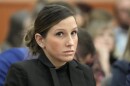 Kouri Richins, a Utah mother of three who authorities say fatally poisoned her husband, Eric Richins, then wrote a children's book about grieving, looks on during a hearing Friday, Nov. 3, 2023, in Park City, Utah. (AP Photo/Rick Bowmer, Pool)