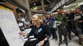 Precinct secretary Ari Fleisig at a caucus precinct site in Des Moines, Iowa, on Monday. The Iowa Democratic Party said that the data collected "was sound" despite the smartphone app malfunction.