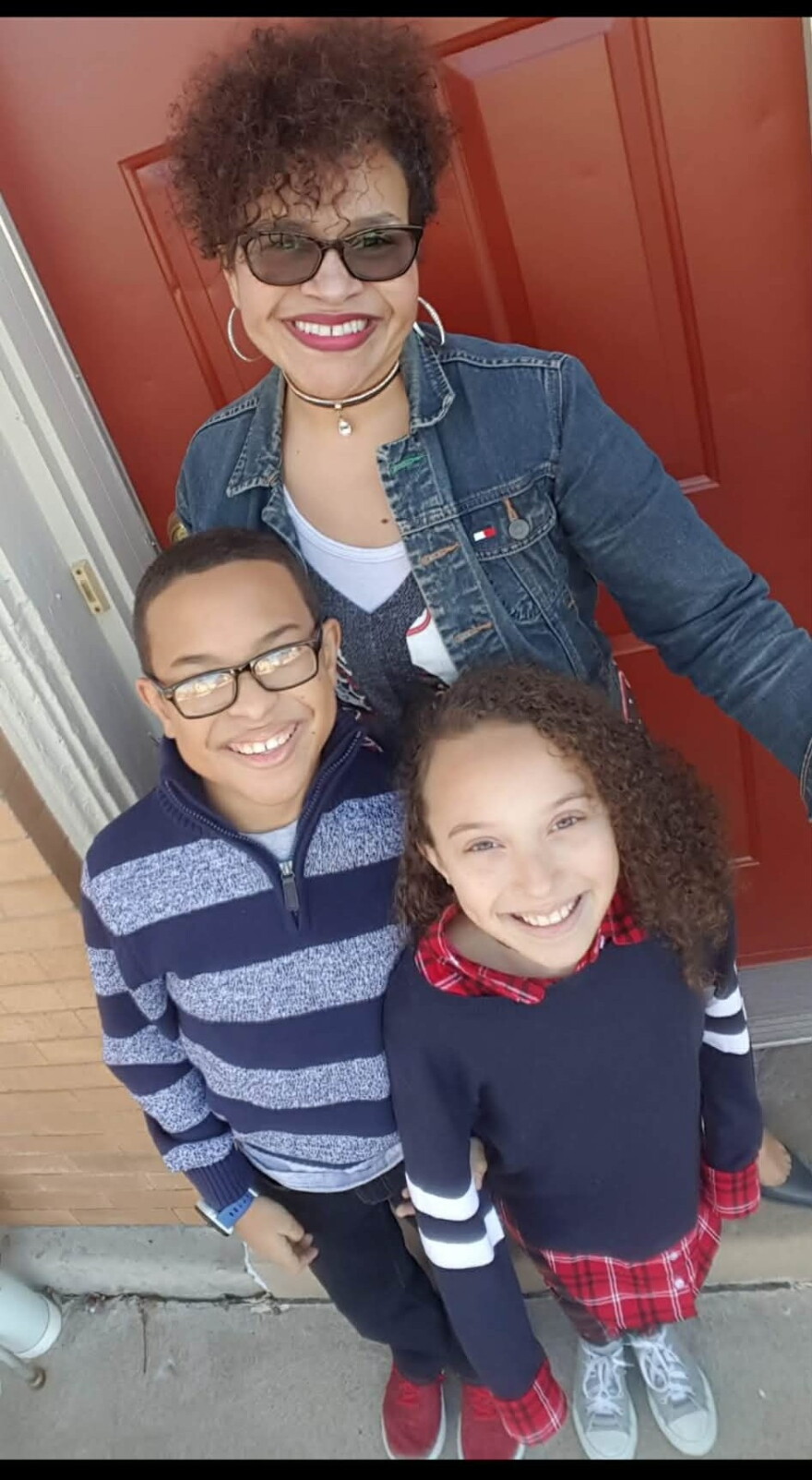 Nichole Collins-Payney and her children in happier times at their Old Chicago apartment in Rock Island.