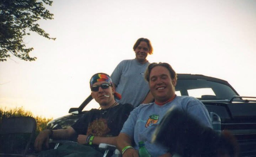 Kam Culbertson sits with friends during a Blissfest festival during the late-1990s. Culbertson said the festival has expanded in the past two decades.