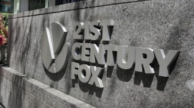This Aug. 1, 2017, photo shows the 21st Century Fox sign outside of the News Corporation headquarters building in New York. (Richard Drew/AP)