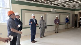 Mayor Ben Walsh, County Executive Ryan McMahon, SCSD Superintendent Anthony Davis, and county facilities commissioner Archie Wixson stand in one of the science rooms on the second floor.