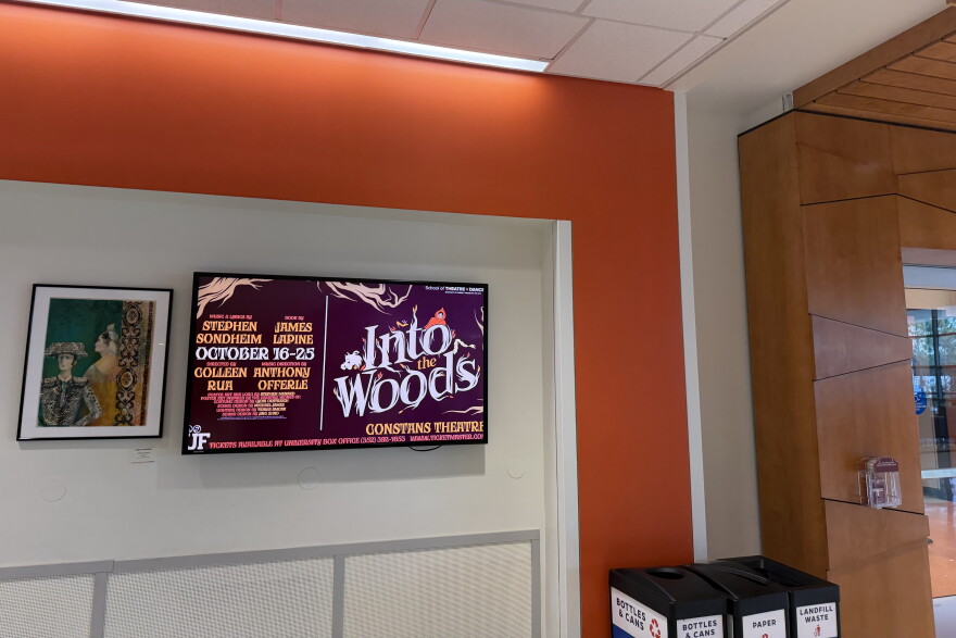 A display in the Reitz Union promotes UF’s upcoming production of “Into the Woods,” a Stephen Sondheim musical that puts a twist on familiar fairy tales.