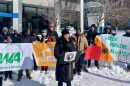Morgan Harper, a community organizer and former U.S. Senate candidate, speaks at a protest in January outside the offices of the Public Utilities Commission of Ohio in Columbus, urging officials to reject a rate increase from the local utility.