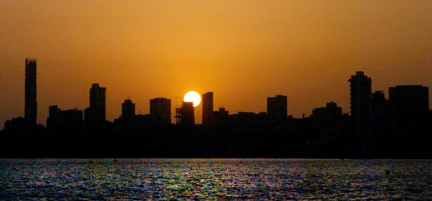 The sun sets over a stretch of the skyline in Mumbai, India, where writer Anand Giridharadas worked as a management consultant after he graduated from college. "I grew up with only a faint idea that another country was also somehow mine," Giridharadas writes of his upbringing in America. "My notion of it was never based on India's history or traditions, its long civilizational parade; it was a first-generation idea of a place in our shared past, nostalgically shared but blessedly past."