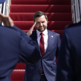 Vice President JD Vance salutes as he walks off Air Force Two, Wednesday, March 18, 2026 at Joint Base Andrews, Md., returning from a day trip to Waterford Township, Mich. (Elizabeth Frantz/The New York Times via AP, Pool)