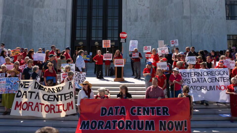 People gather in front of the Oregon State Capitol, advocating for a statewide data center moratorium, in Salem, Ore., Sept. 8, 2026.