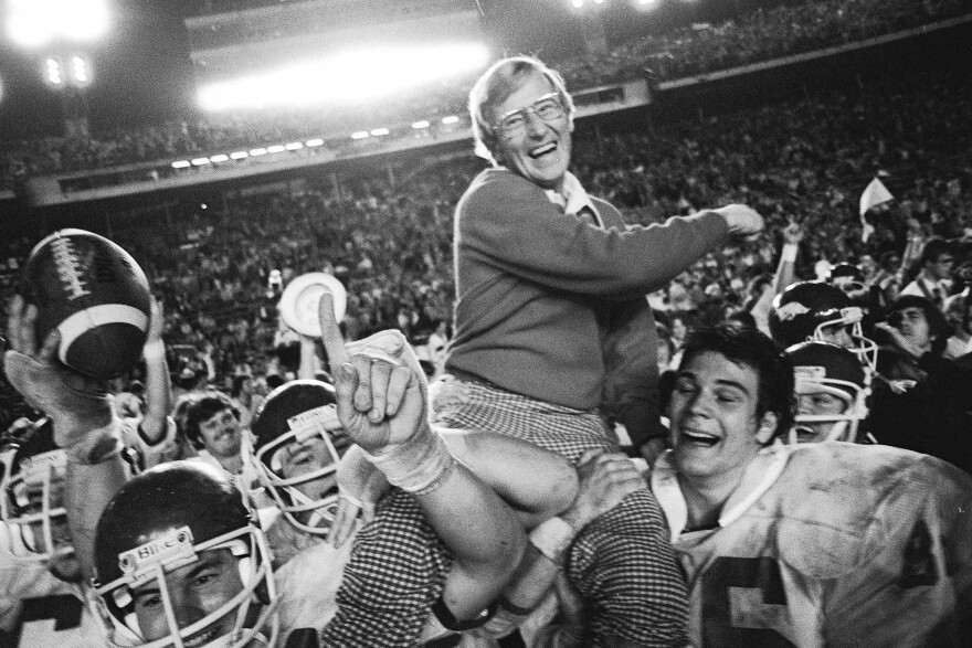 FILE - Arkansas coach Lou Holtz is carried by his players after defeating Oklahoma in the Orange Bowl NCAA college football game, Jan. 2, 1978, in Miami, Fla. (AP Photo/Phil Sandlin, File)