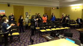 Advocates chant “fair maps now” in a House committee room after the Ohio Redistricting Commission adjourns without making plans for new state legislative district maps.