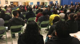 Immigrants packed a gym in Bellevue on Thursday night to talk about Trump's immigration plan.