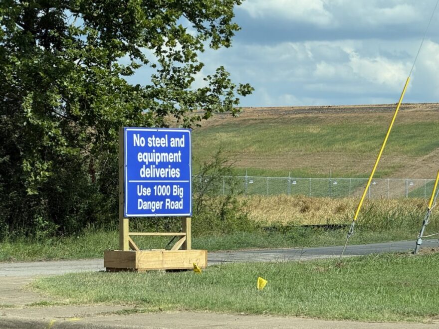 A sign directing deliveries to a data center construction site in Clarksville, Arkansas on July 13, 2026.