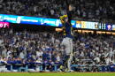 Milwaukee Brewers catcher William Contreras celebrates the final out of Game 4 of baseball's National League Championship Series between the Milwaukee Brewers and the Los Angeles Dodgers, Thursday, Oct. 15, 2026, in Los Angeles. (Ashley Landis/AP)