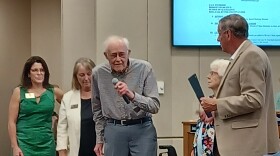 By special proclamation the Peoria County Board honored Wheels 'O Time Museum of Dunlap on their 40th anniversary. Museum co-founder Gary Bragg is pictured acknowledging the proclamation.