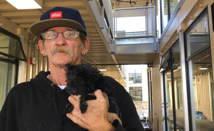 Vietnam-era veteran Jimmy Palmiter and his poodle Fifi will be among the first residents at Potter's Lane.