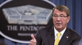 In this Aug. 20, 2015 file photo, Defense Secretary Ash Carter speaks during a news conference at the Pentagon. Carter spoke with his Russian counterpart Friday, the first step in direct military talks proposed by Russia about Moscow's military buildup to support the Syrian government against the Islamic State group.