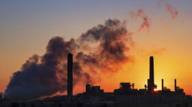 In this July 27, 2018, file photo, the Dave Johnson coal-fired power plant is silhouetted against the morning sun in Glenrock, Wyo. (J. David Ake/AP)