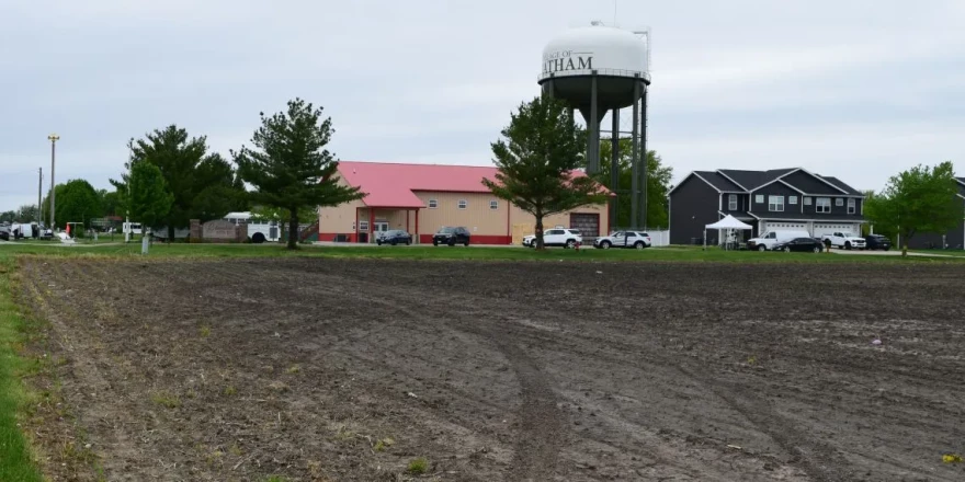 Tracks through a farmer’s field show the path of a black Jeep that hit a building housing an after-school program in Chatham. The Jeep was driven by Marianne Akers, a former employee of the Illinois State Police.