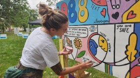 Local artist Adrienne Luther Johnson said talking about 988 in a colorful and playful way, through art, is an important part of destigmatizing asking for help. "I feel like as a millennial, I feel like we were raised through this evolution of the erasure of the stigma with suicide talk, like any sort of mental health discussion," she said.