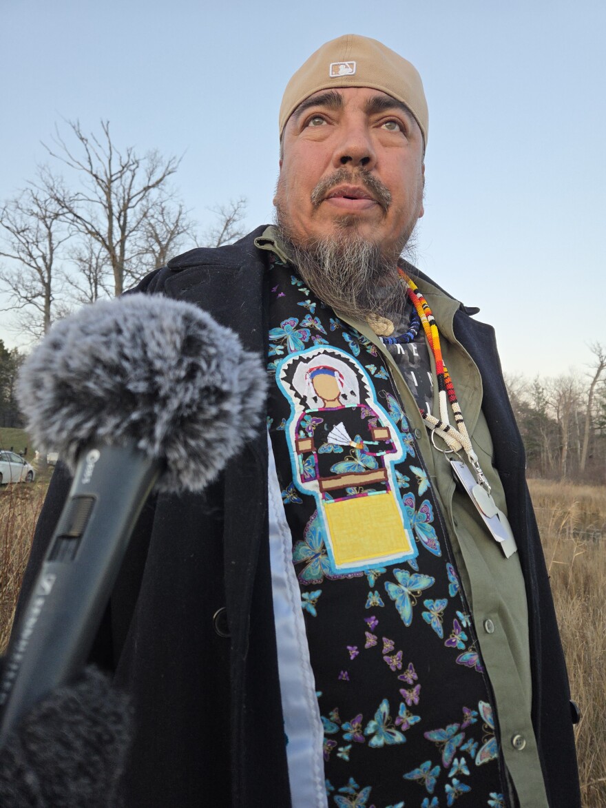 Nate Taylor, executive director of the Endazhi-Nitaawiging Charter School in Red Lake, gives an interview to KAXE on the shores of Fuller's Lake on Nov. 12, 2025.