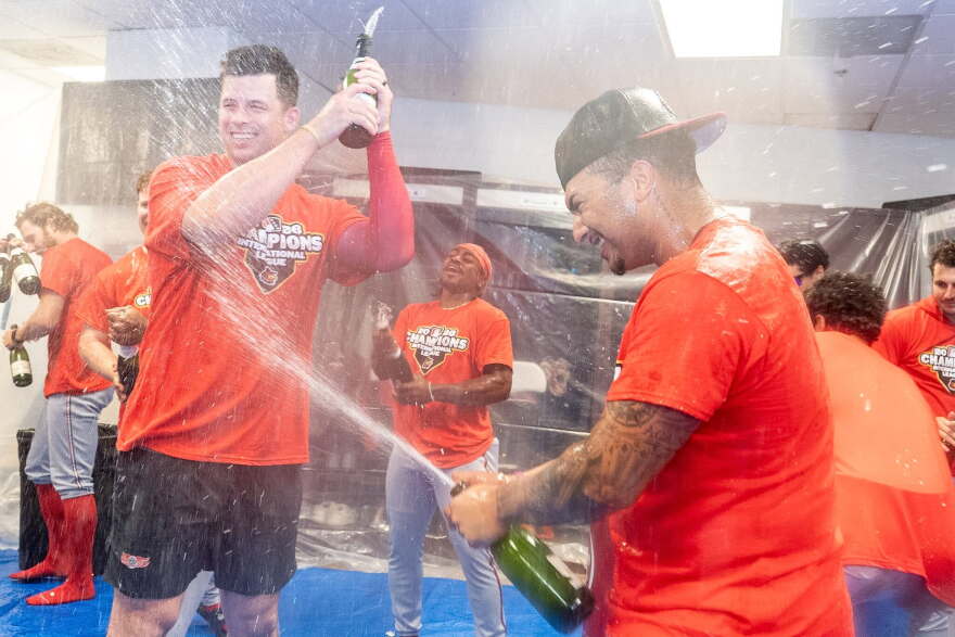 Rochester Red Wings players celebrate their International League championship on Thursday, after trailing 2-1 in the eighth inning.