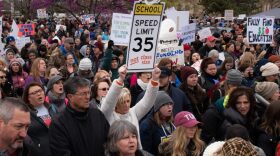 Teachers, students and supporters march in front of the State Capitol on April 2, 2018, the first day of a teacher walkout aimed at increasing education funding.
