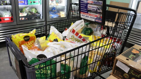 A shopping cart filled with snacks at the Kenai Peninsula Food Bank