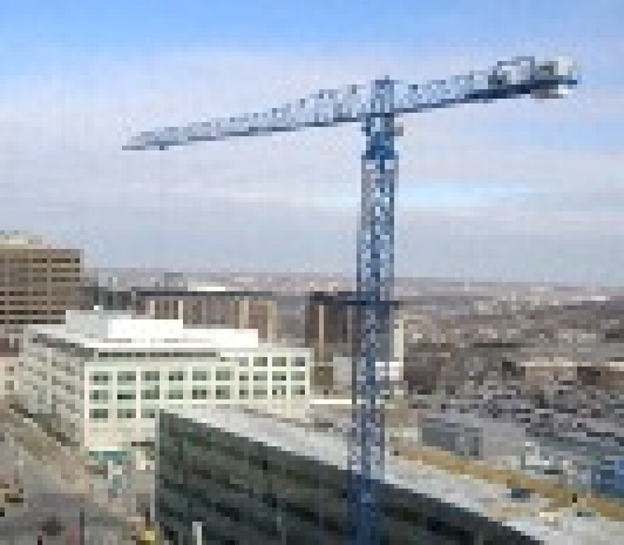 Jobs creation is only part of labor interest in mayoral race. Cranes over downtown KC.