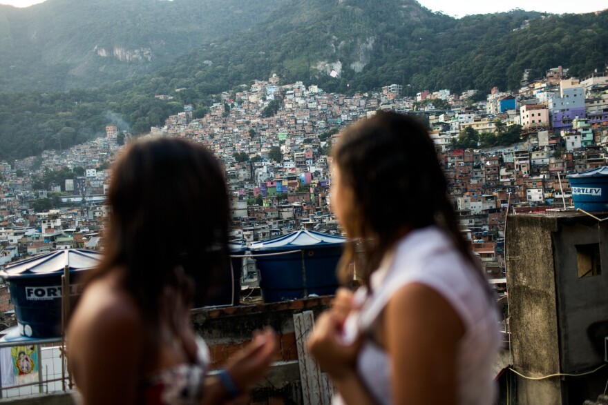 What's up on the roof: Milena and Lala hang out on the rooftop of Milena's house in the Rocinha <em>favela.</em>