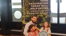 This sign near the exit doors of the Wisconsin Center thanks people for getting a COVID-19 vaccine shot.
