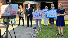 Jacqueline Franchetti, at far right, is urging changes to the procedures that govern family court proceedings after her 2-year-old daughter Kyra was killed by the girl's father.
