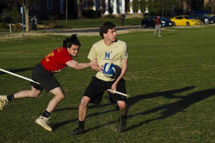 John Sheridan (left) lunges to steal the ball from Dan Reise.