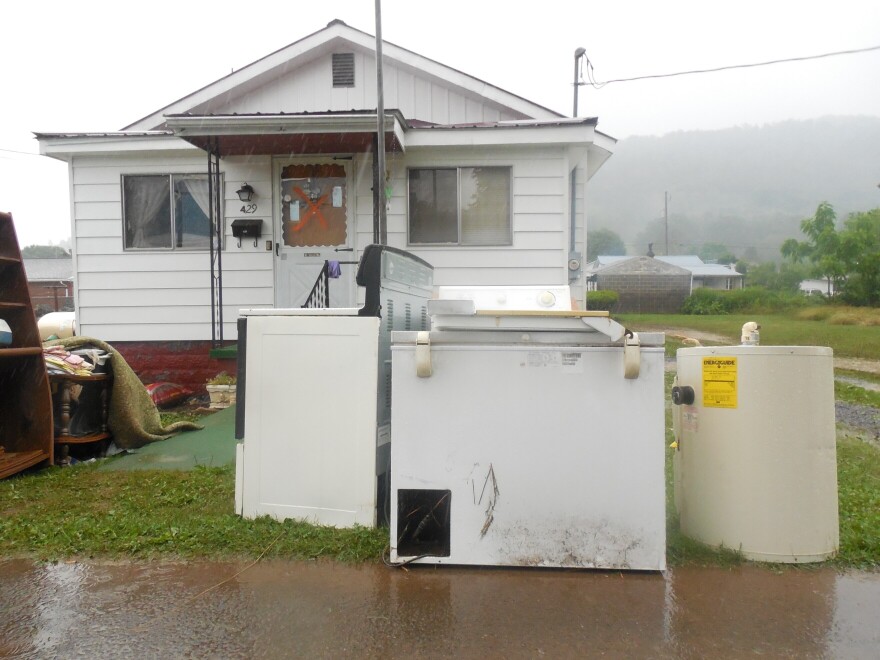A small white home in Rainelle that was damaged by flooding in June 2016