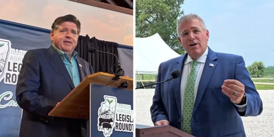 Gov. JB Pritzker, left, and Republican Darren Bailey speak at a candidate forum on agriculture issues at a farm near Bloomington on Monday, Aug. 10, 2026.