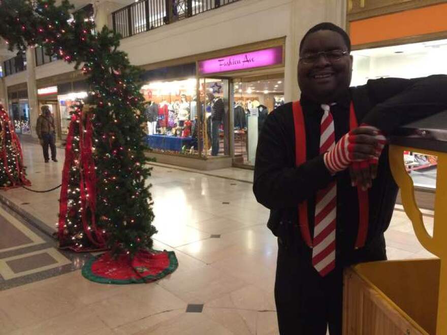 Mike Brown, Kringle's Inventionasium train conductor and candidate for a kidney transplant, at the Tower City Center.