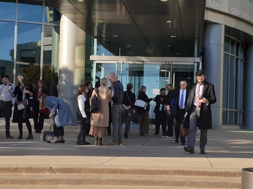 Attorneys and plaintiffs left the federal courthouse last year during the arguments phase of the transgender healthcare trial.