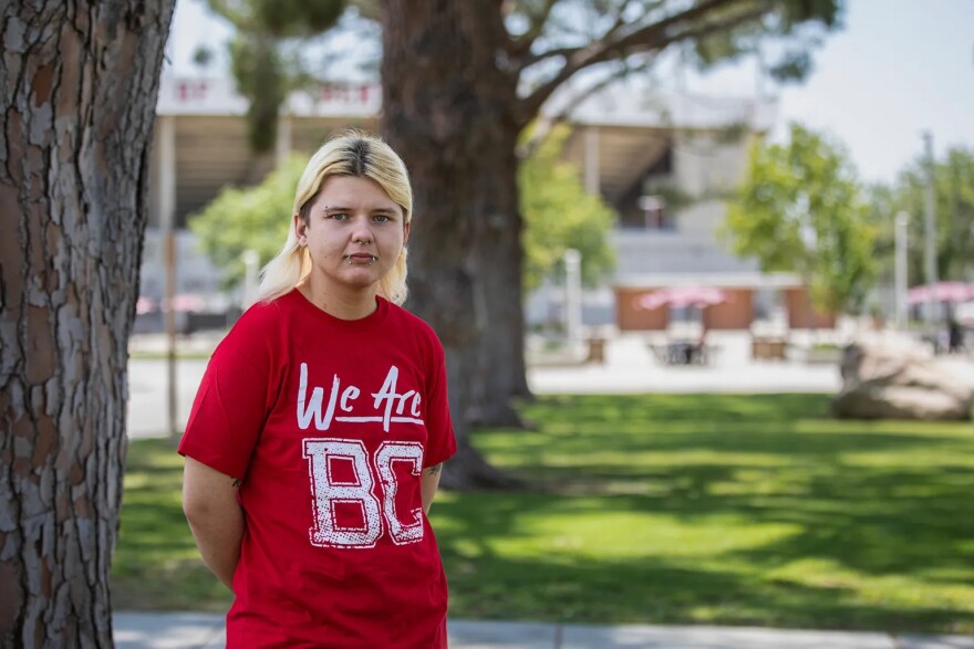 Cecil Dexter, a member of the Lavender Initiative at Bakersfield College, stands at the entrance of the Campus Center on June 14, 2023.