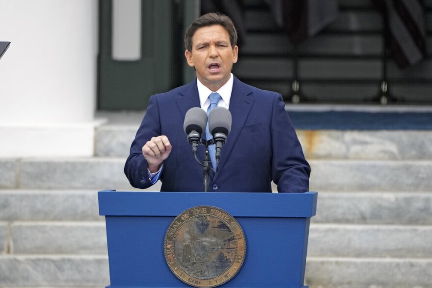 FILE - Florida Gov. Ron DeSantis speaks after being sworn in to begin his second term during an inauguration ceremony outside the Old Capitol Jan. 3, 2023, in Tallahassee, Fla. DeSantis may be months away from publicly declaring his presidential intentions, but his potential rivals aren’t holding back. A half dozen high-profile Republican White House prospects have begun courting top political operatives in states like New Hampshire and Iowa. (AP Photo/Lynne Sladky, File)