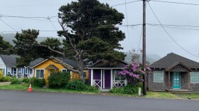 This colorful group of cottages in a commercial zone on West Second Street was originally a “motor court” built in the 1940s. Today the five units, which sit on a 100 by 100 foot lot, operate as long-term rentals. They were grandfathered into the city’s current housing code as a non-conforming housing type. It is an example of so-called “cottage clusters” the city believes fits into the community.