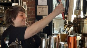 Taylor Spaniol pours a pint