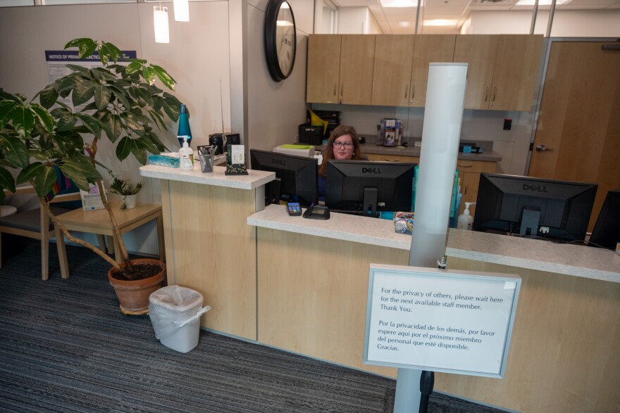 An employee of Planned Parenthood in Mankato, Minnesota sits at the front desk during lunch hour. The clinic recently moved into a new, larger location closer to a large state university.