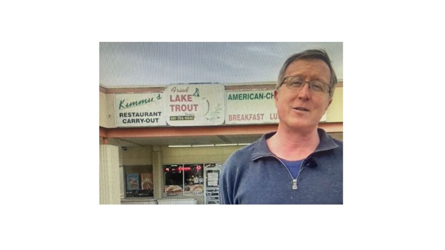 Johns Hopkins stands outside Kimmy's Carry-out, undoubtedly waiting for his tasty Lake Trout