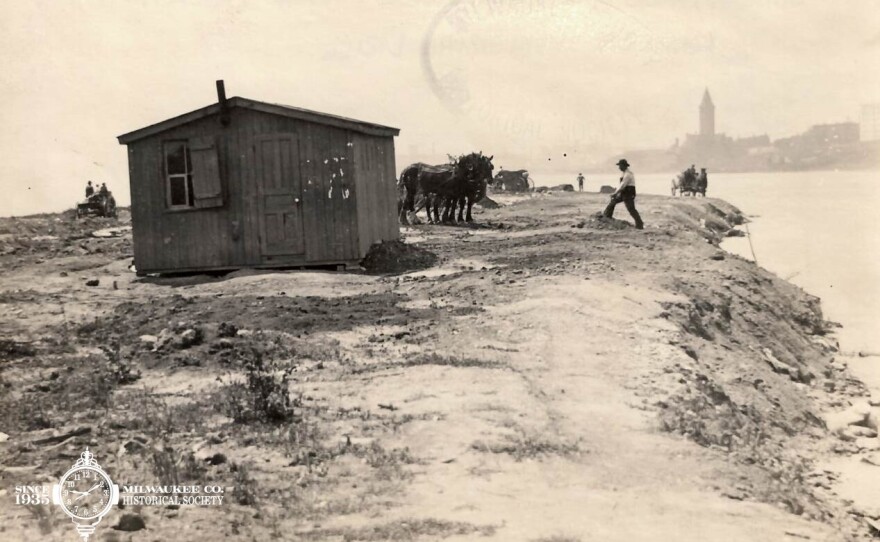 Landfill in motion to create Milwaukee lakefront circa 1910s.