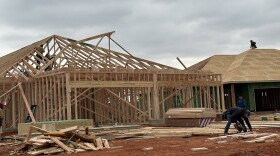 Construction workers frame a duplex in Tuttle, being built by Silva Development as part of Oklahoma's new Housing Stability Program.