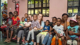 Bekka Ross Russell (center) is the founder and executive director of an organization called The Small Things, a non-profit working to provide assistance for orphaned or vulnerable Tanzanian children and their families. It started out as an orphanage, but has grown into something much bigger. 