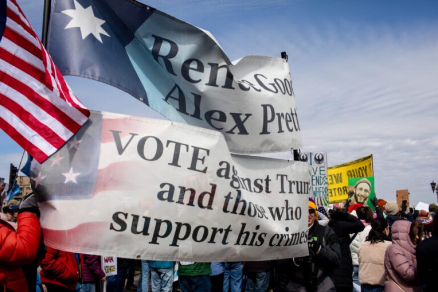 Thousands gather, many with signs honoring Renee Good and Alex Pretti, who were killed by federal agents, at St. Paul college to march to the Minnesota State Capitol during the third No Kings rally in St. Paul, March 28, 2026.