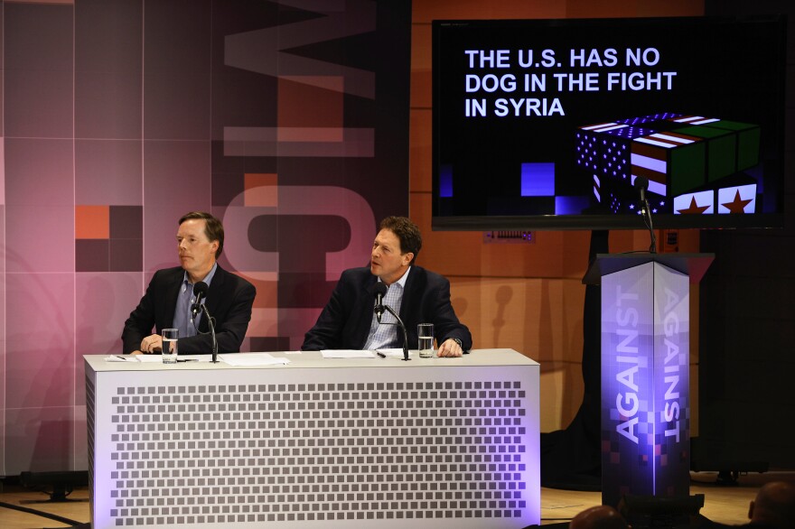 Nicholas Burns and Nigel Sheinwald argue against the motion "The U.S. Has No Dog In The Fight In Syria."