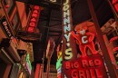 Neon signs hang in the expanded portion of the American Sign Museum