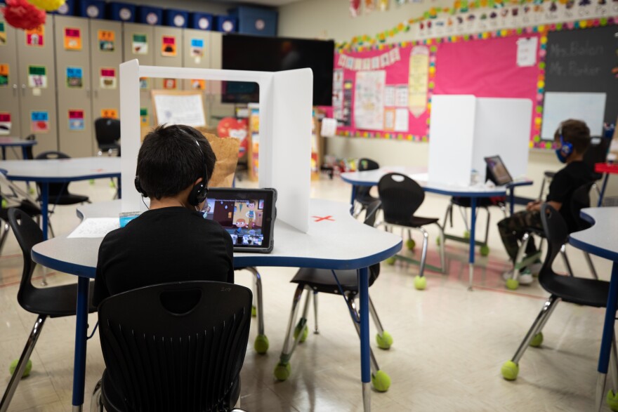 Students learn at Boone Elementary School in South Austin during the coronavirus pandemic.